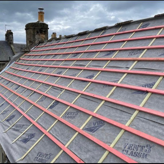 New roof with slate banding
